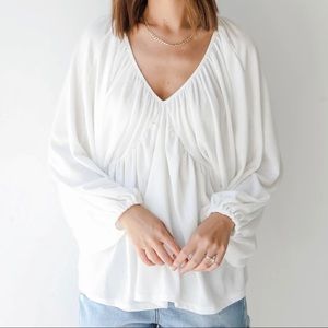 NEW! White Blouse with an oversized Babydoll fit. Large